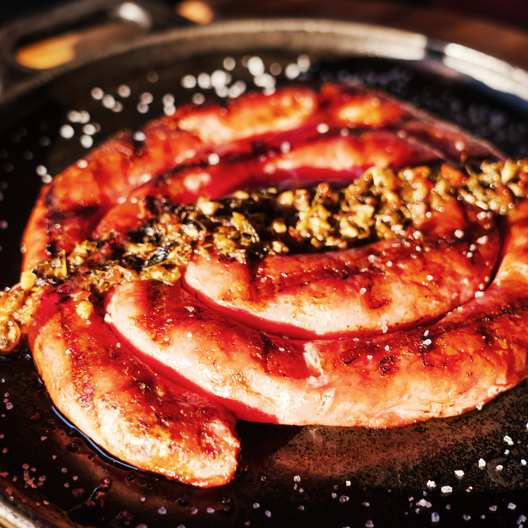 Chorizo Toscanita con salsa chimichurri y mandioca cocida